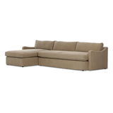 Amber Lewis x Four Hands Aurelia sectional in Broadway Canvas linen styled in a living room, left-facing chaise extended across a 128-inch span