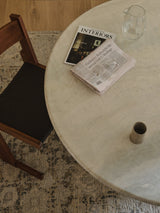 Armadillo Basilica Rug in Clove, a second view of the handcrafted wool rug in a styled interior