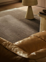 Armadillo Corsica Rug in Flannel, handwoven wool and linen rug shown in a room setting