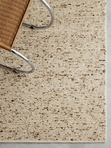 Faroe Rug by Armadillo, hand-knotted undyed wool rug, styled in a room at Calimia Home