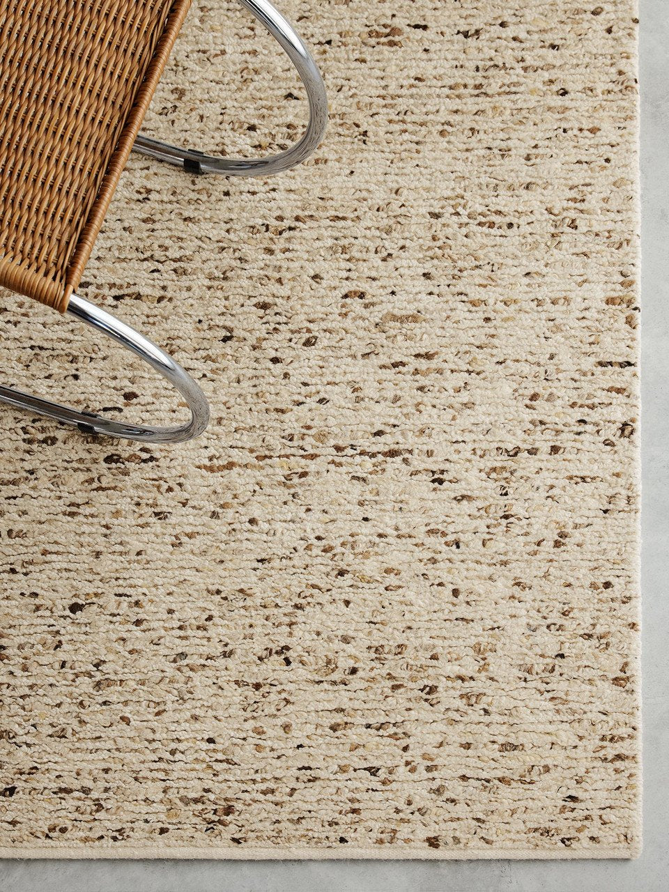 Faroe Rug by Armadillo, hand-knotted undyed wool rug, styled in a room at Calimia Home