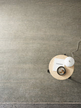Armadillo Corsica Rug in Saltbush, a second view of the handwoven wool and linen rug in a styled interior