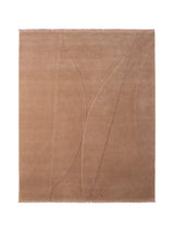Armadillo Marea Rug in Clay, overhead view of the hand-knotted and hand-carved wool weave and edge finish