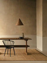 Mojave Rug by Armadillo, hand-knotted jute rug, styled in a room at Calimia Home