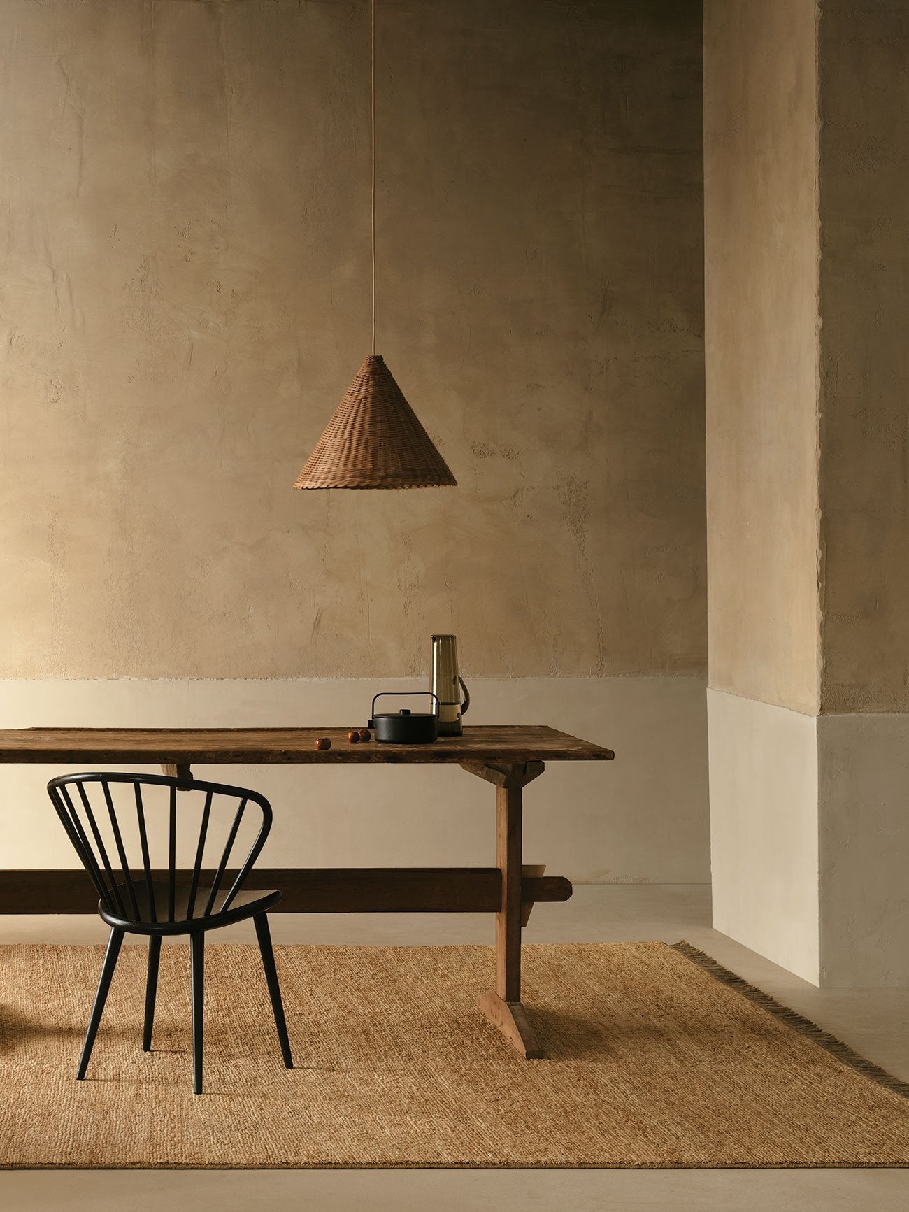 Mojave Rug by Armadillo, hand-knotted jute rug, styled in a room at Calimia Home
