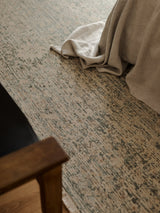 Minuet Rug by Armadillo, hand-knotted clipped wool rug, styled in a room at Calimia Home