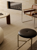 Armadillo Latitude Rug in Beluga, a second view of the handwoven linen flatweave rug in a styled interior