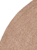 Armadillo Braid Rug in Blush, corner close-up of the wool and viscose blend pile and edge