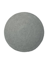 Armadillo Braid Rug in Heron, overhead view of the hand-braided wool blend weave and edge finish