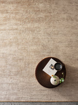 Armadillo Staccato Rug in Latte, a second view of the hand-knotted silk and linen rug in a styled interior