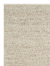 Armadillo Pinnacle Rug in Wheat, corner close-up of the new zealand wool and undyed jute pile and edge
