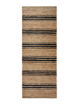 Armadillo River Nook Rug in Natural & Indigo, overhead view of the handwoven jute weave and edge finish