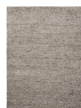 Armadillo Meadow Rug in Driftwood, corner close-up of the wool pile and edge