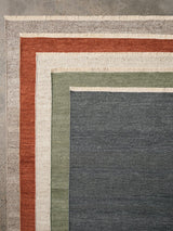 Cable Rug by Armadillo, handwoven soumak wool rug, styled in a room at Calimia Home
