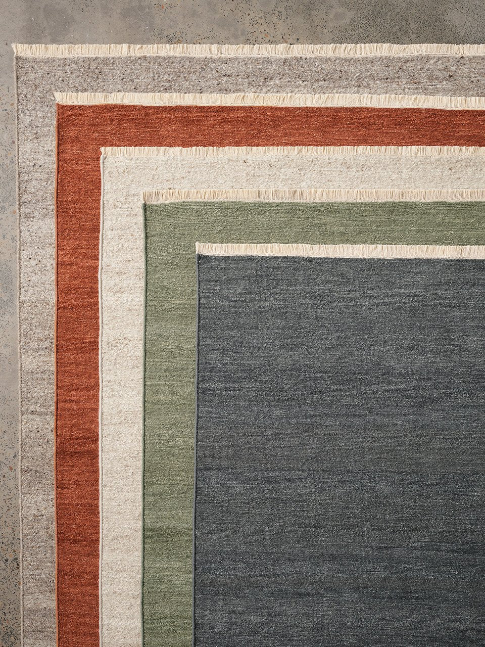 Cable Rug by Armadillo, handwoven soumak wool rug, styled in a room at Calimia Home
