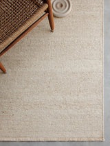 Armadillo Cable Rug in Calico, a second view of the handwoven soumak wool rug in a styled interior