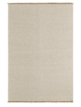Armadillo Abbey Rug in Cane, a second view of the handwoven wool and jute rug in a styled interior
