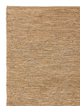 Armadillo River Nook Rug in Natural, corner close-up of the jute pile and edge