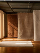 Marea Rug by Armadillo, hand-knotted and hand-carved wool rug, styled in a room at Calimia Home