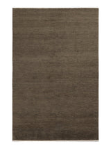 Armadillo Thatch Rug in Gumnut, overhead view of the hand-knotted wool weave and edge finish