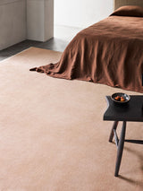 Armadillo Eden Rug in Abalone, hand-knotted wool rug shown in a room setting