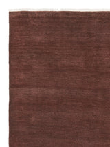 Armadillo Agra Rug in Redwood, corner close-up of the wool pile and edge