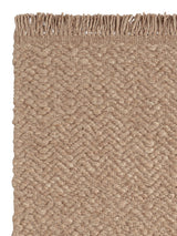 Armadillo Arroyo Rug in Sepia, corner close-up of the felted wool pile and edge