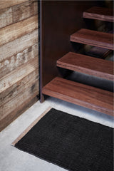 Nest Nook Rug by Armadillo, handwoven jute flatweave rug, styled in a room at Calimia Home