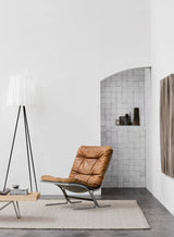 Armadillo Winnow Rug in Alabaster, a second view of the handwoven wool flatweave rug in a styled interior
