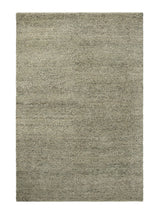 Armadillo Meadow Rug in Pistachio, overhead view of the hand-knotted wool weave and edge finish