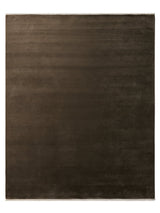 Armadillo Eden Rug in Chestnut, a second view of the hand-knotted wool rug in a styled interior