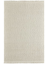 Armadillo Arroyo Rug in Chalk, a second view of the handwoven felted wool rug in a styled interior