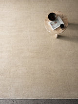 Armadillo Corsica Rug in Paperbark, a second view of the handwoven wool and linen rug in a styled interior