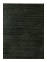 Armadillo Agra Rug in Juniper, overhead view of the hand-knotted wool weave and edge finish