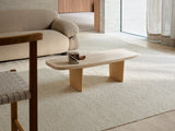 Armadillo Pebble Rug in Tofu, overhead view of the handwoven boucle wool weave and edge finish