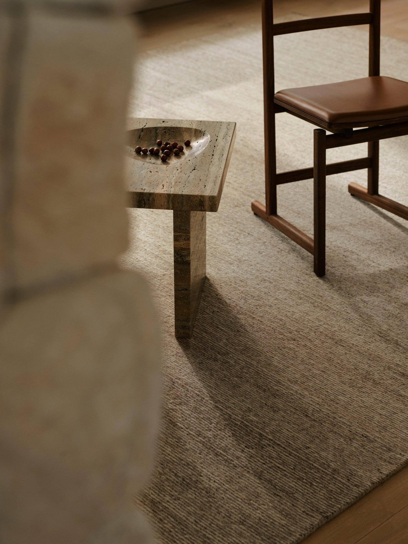 Field Rug by Armadillo, handwoven soumak wool rug, styled in a room at Calimia Home