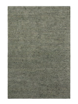 Armadillo Meadow Rug in Seagrass, a second view of the hand-knotted wool rug in a styled interior