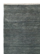 Armadillo Agra Rug in Marlin, corner close-up of the wool pile and edge