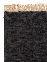 Armadillo Sahara Nook Rug in Charcoal, corner close-up of the jute pile and edge