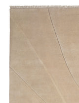 Armadillo Marea Rug in Savon, corner close-up of the wool pile and edge