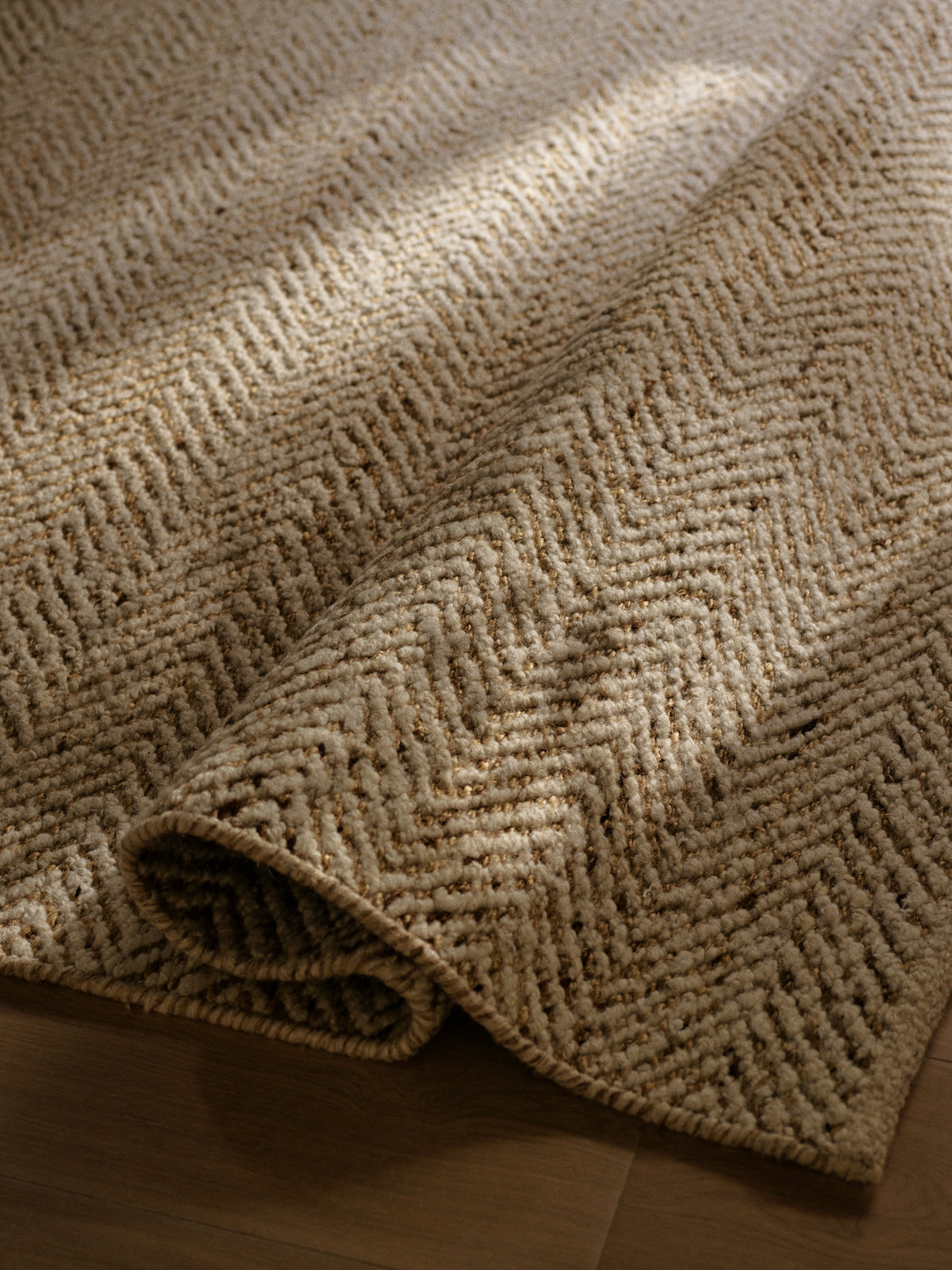 Pinnacle Rug by Armadillo, handwoven wool and jute rug, styled in a room at Calimia Home