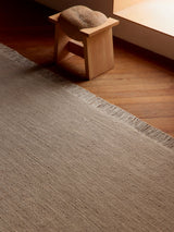 Armadillo Willow Rug in Kiln, detail of the linen, wool, and jute weave and texture