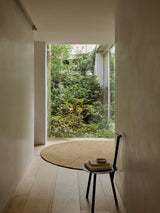 Armadillo Nimbus Rug in Wasabi, overhead view of the hand-braided new zealand wool weave and edge finish