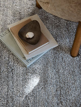 Armadillo Petra Rug in Arctic, a second view of the hand-knotted new zealand wool rug in a styled interior