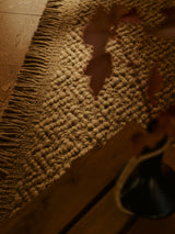 Armadillo Arroyo Rug in Sepia, overhead view of the handwoven felted wool weave and edge finish