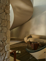 Armadillo Selva Rug in Walnut, handwoven afghan wool kilim rug shown in a room setting