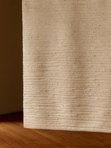 Armadillo Cirrus Rug in Salt, hand-knotted wool rug shown in a room setting