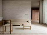 Armadillo Pebble Rug in Tofu, a second view of the handwoven boucle wool rug in a styled interior