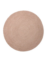Armadillo Braid Rug in Blush, a second view of the hand-braided wool blend rug in a styled interior