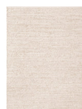 Armadillo Cirrus Rug in Salt, corner close-up of the wool pile and edge